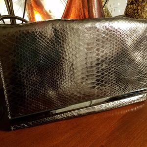 Michael Kors metallic embossed leather purse